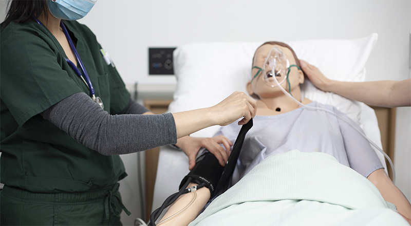 A nursing student practising