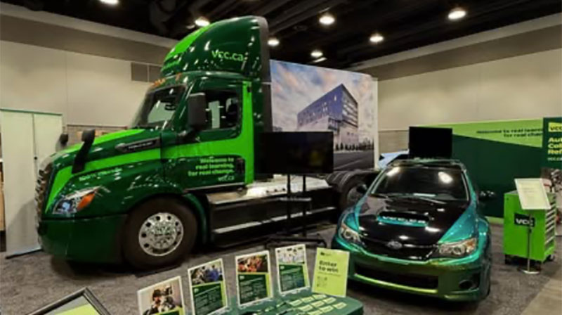 electric semi truck and toyota mirai on display at the auto show